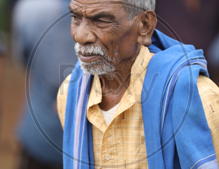 Indian Old Man with blue towel