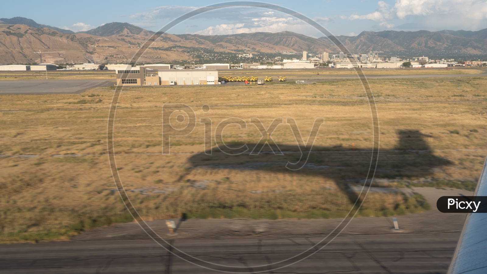View of Shadow of Airplane against Wasatch Mountain Ranges, Salt Lake City, Utah