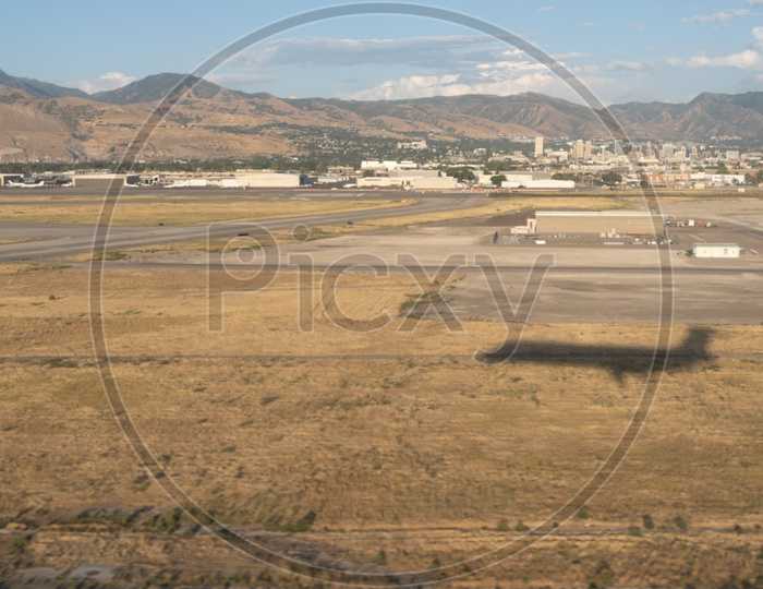 Aerial view of Shadow of Airplane on the Empty Land in Salt Lake City, Utah