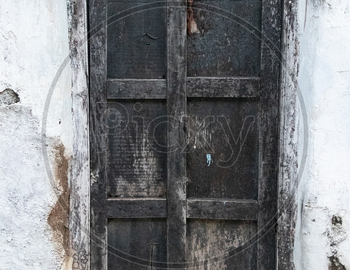 Traditional Old Wooden Door Of a House At Indian Rural Villages