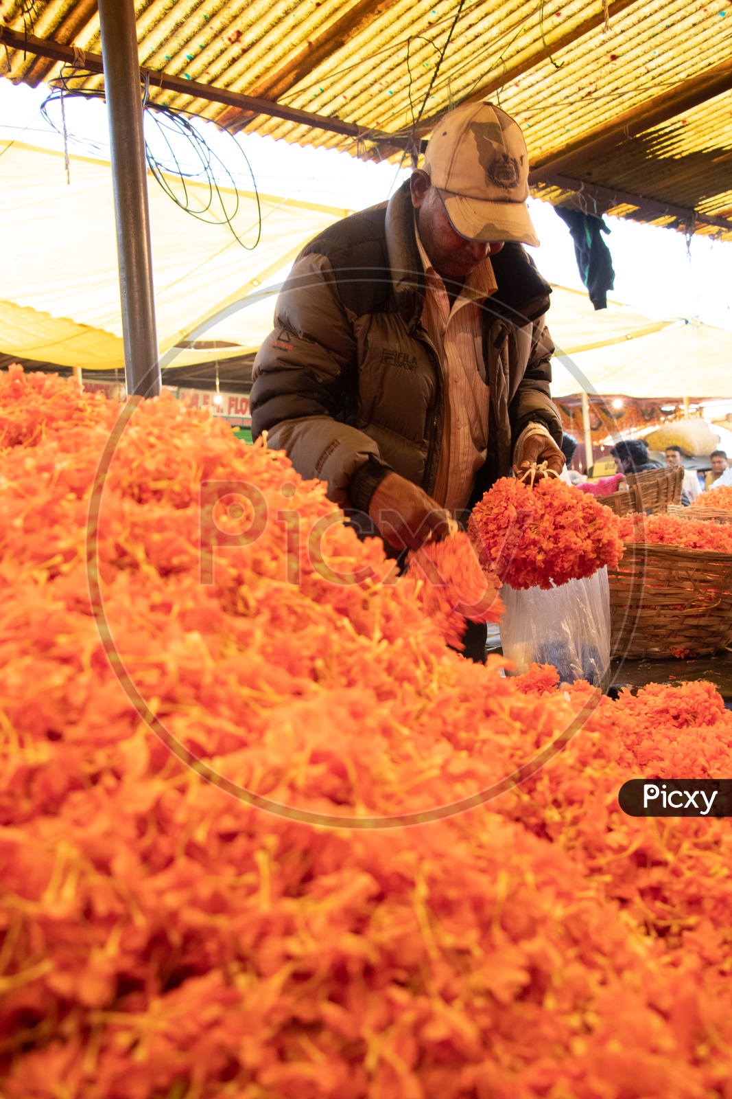 Flowers Piles At Stalls In Gudimalkapur Flower Market