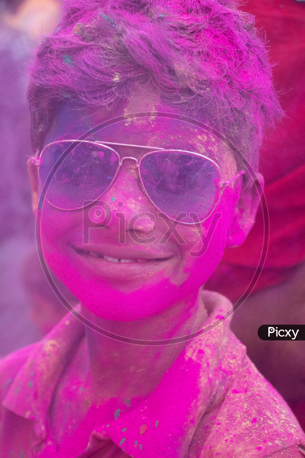 Indian Children Celebrating Holi Festival Filled In Colors