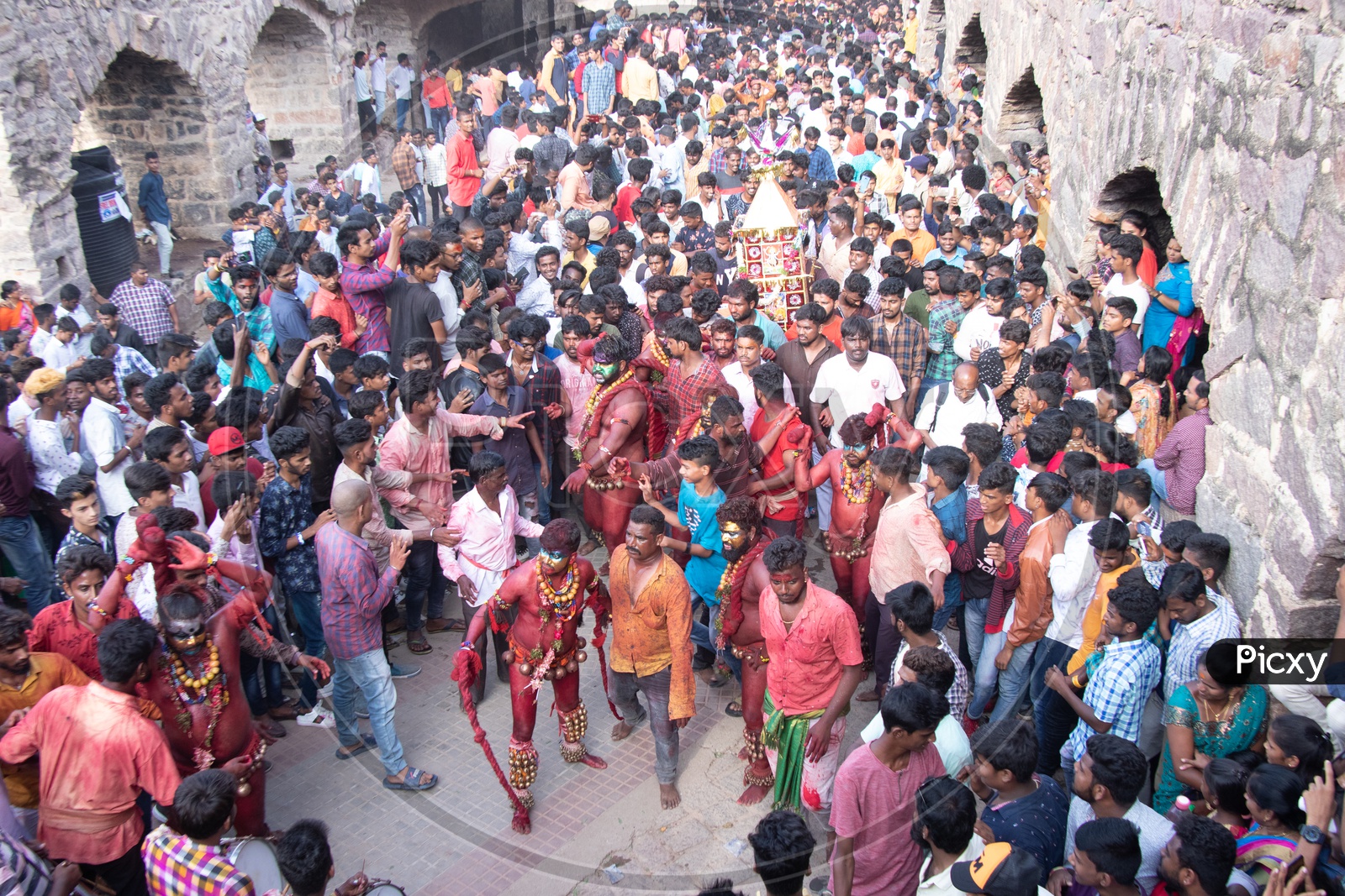 Pothuraju Surrounded By Crowd During Bonalu Festival Celebrations At Golconda Fort