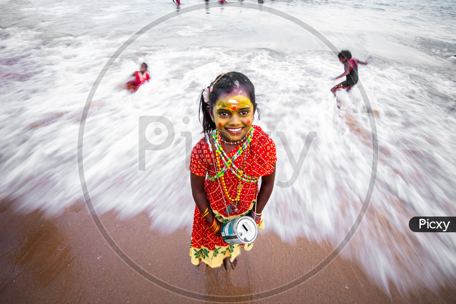 Indian Girl in Makeup At a Beach And Donation Box In Hand
