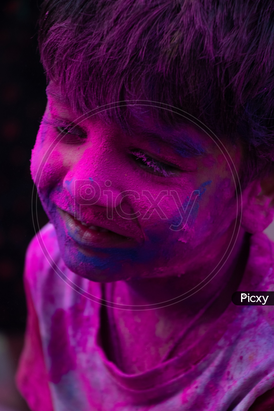Indian Children Filled in Holi Colors Celebrating Holi Festival