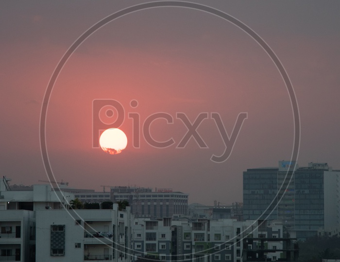 Sunset Sun  Over High Rise Buildings City scape In Hyderabad