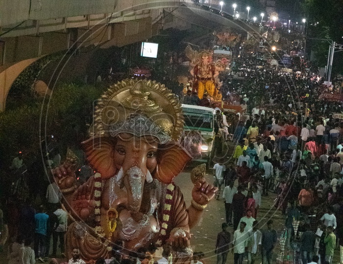 Lord Ganesh Idols In Procession During Ganesh Visarjan Or Nimarjan Event At Tankbund In Hyderabad
