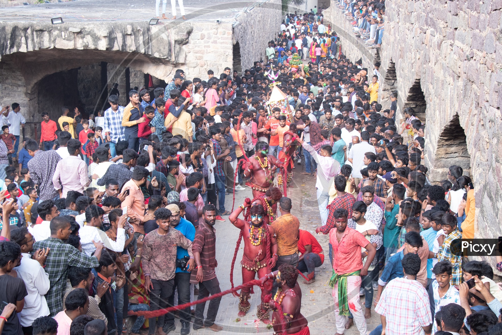 Pothuraju Surrounded By Crowd During Bonalu Festival Celebrations At Golconda Fort