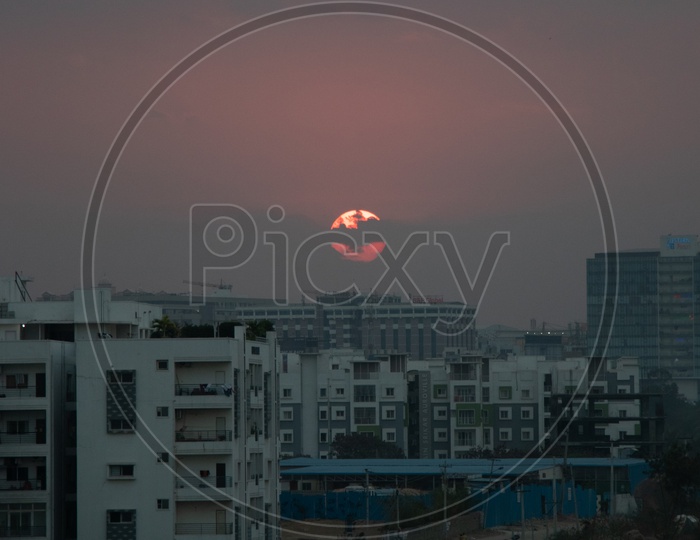 Sunset Sun  Over High Rise Buildings City scape In Hyderabad
