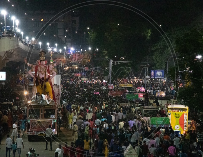 Lord Ganesh Idols In Procession During Ganesh Visarjan Or Nimarjan Event At Tankbund In Hyderabad