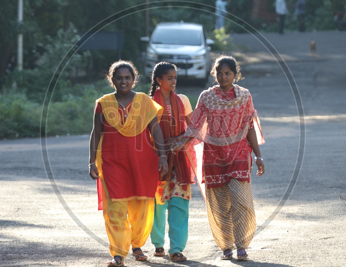 Group of Indian Girls walking on the road