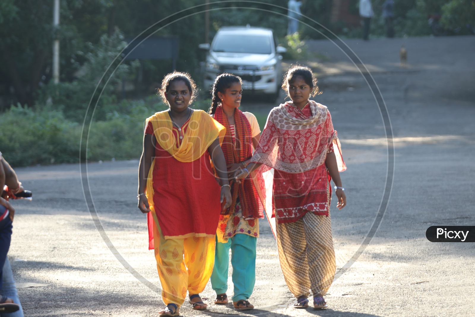 Group of Indian Girls walking on the road