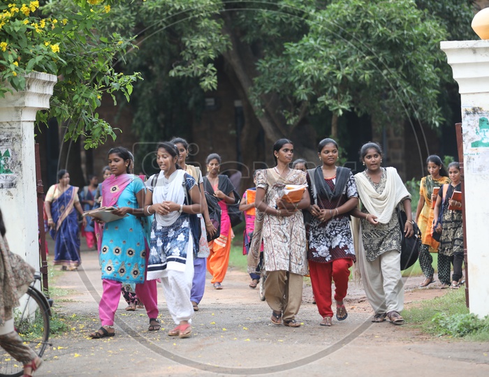 Group of Indian College girls walking out of the college