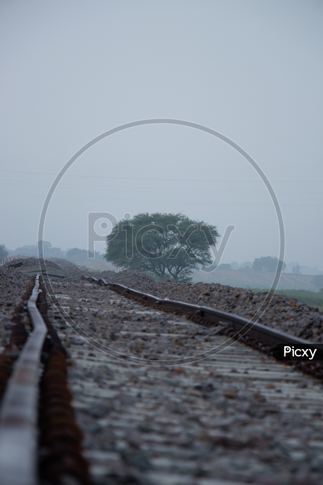 Lone Railway Track On an Foggy Morning