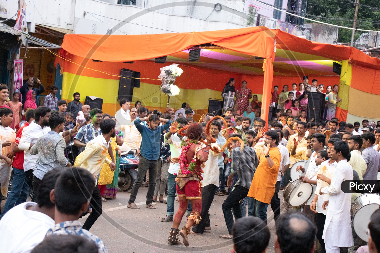 Pothuraju Surrounded By Crowd During Bonalu Festival Celebrations