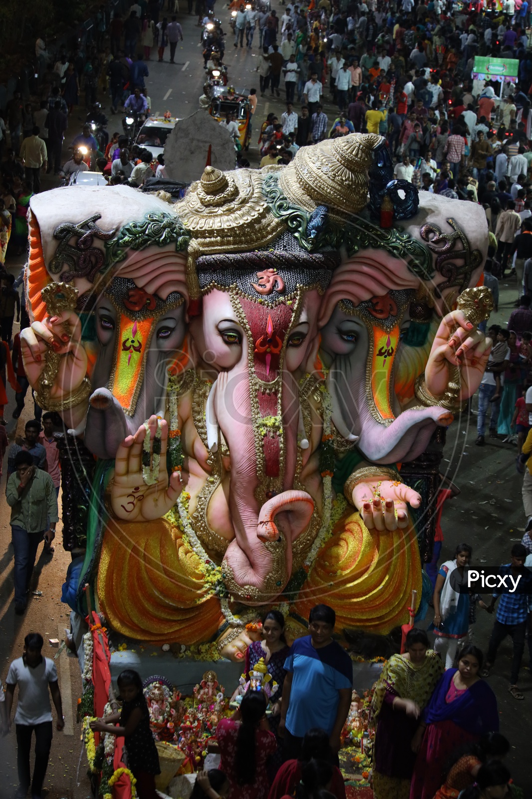 Image of Ganesh Idols In Trucks And Crowd Of Devotees At Tank Bund For ...