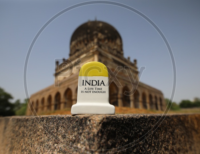 India Milestone Miniature  With Qutub Shahi Tombs in Background