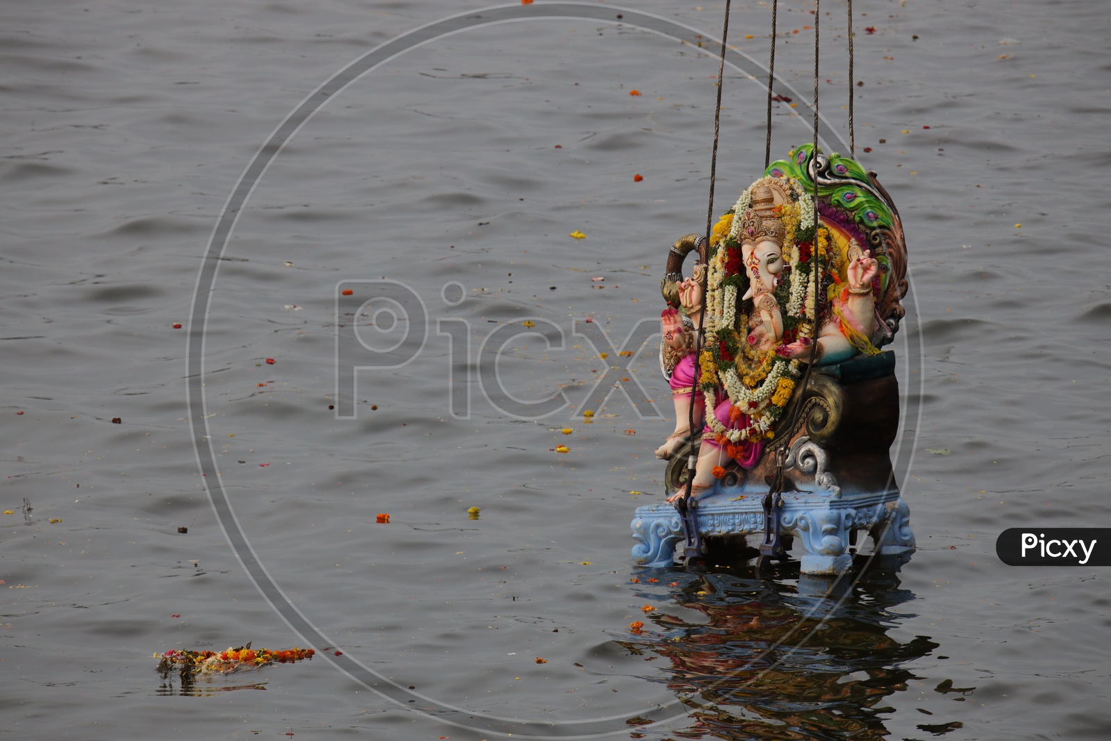 Ganesh  Idols on Cranes  For Immersion in Hussain Sagar Lake  During Ganesh Visarjan Or Nimarjan  Event  At Tankbund In Hyderabad