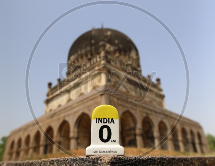 India Milestone Miniature With Qutub Shahi Tombs in Background