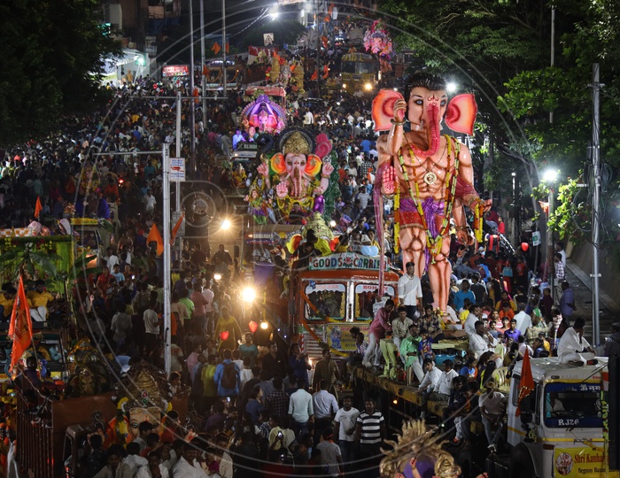 Image of Ganesh Idols Carrying In Heavy Trucks For Immersion In Hussain