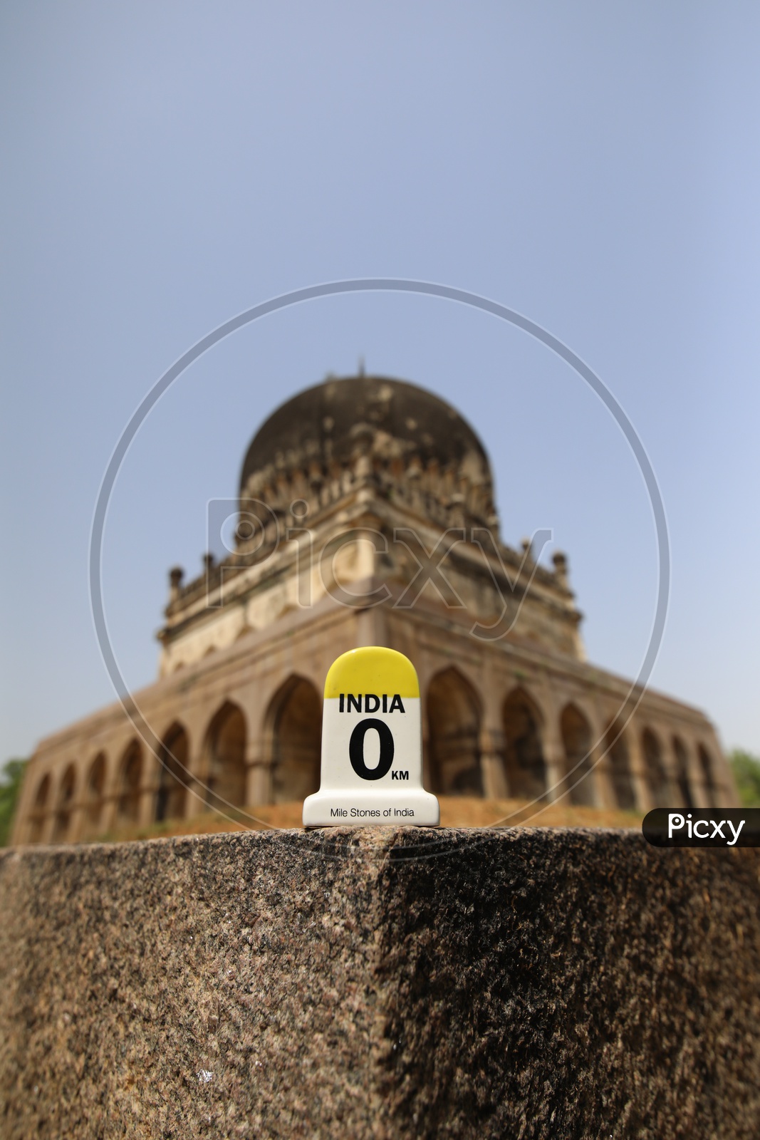 India Milestone Miniature With Qutub Shahi Tombs in Background
