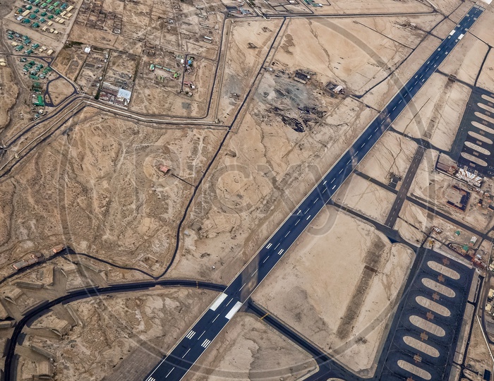 Aerial View Of Leh Airport With Runway And Airport Terminal From Flight Window