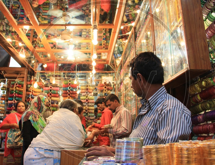 Woman Shopping in Bnagle Stores in  Ghansi Bazaar Near Charminar