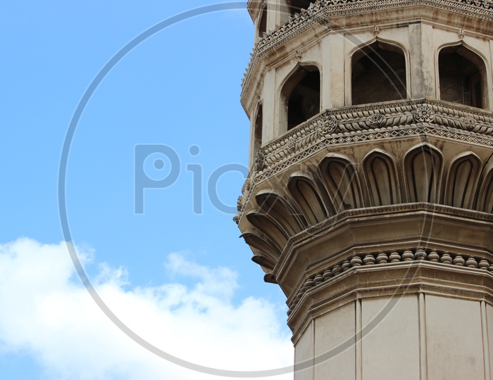 Architecture Of Charminar With Designs And Sky As Background