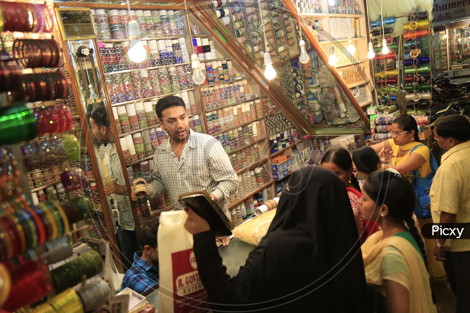 Muslim Woman Shopping Bangles Around Ghansi Bazaar Shops
