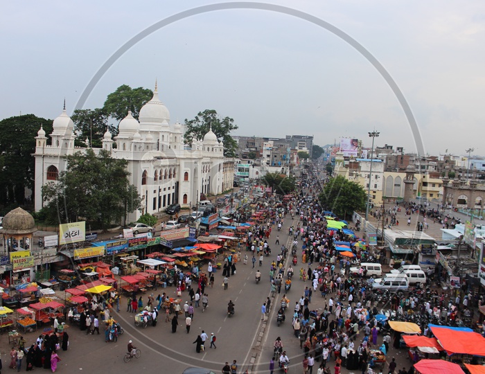 Aerial View Of Streets Around Charminar With Visitors And Vehicles Moving Around It