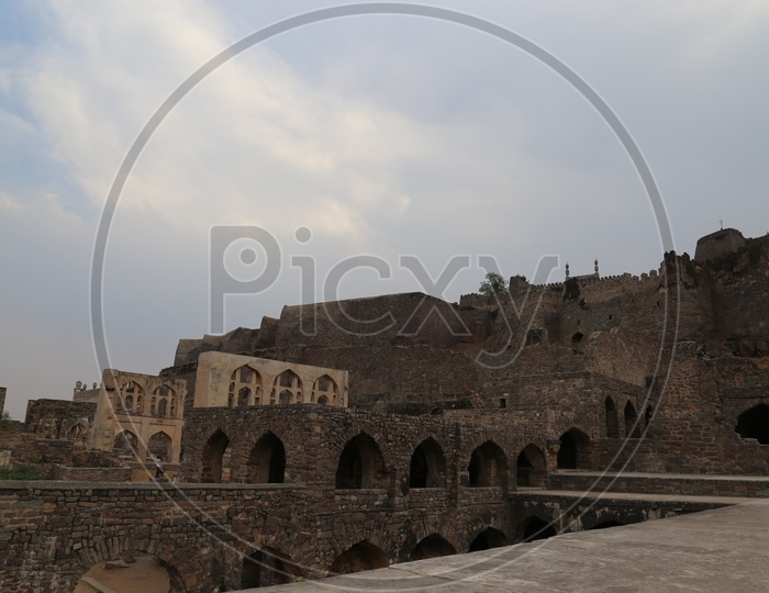 Old Ruins Of Golconda Fort With Blue Sky Background