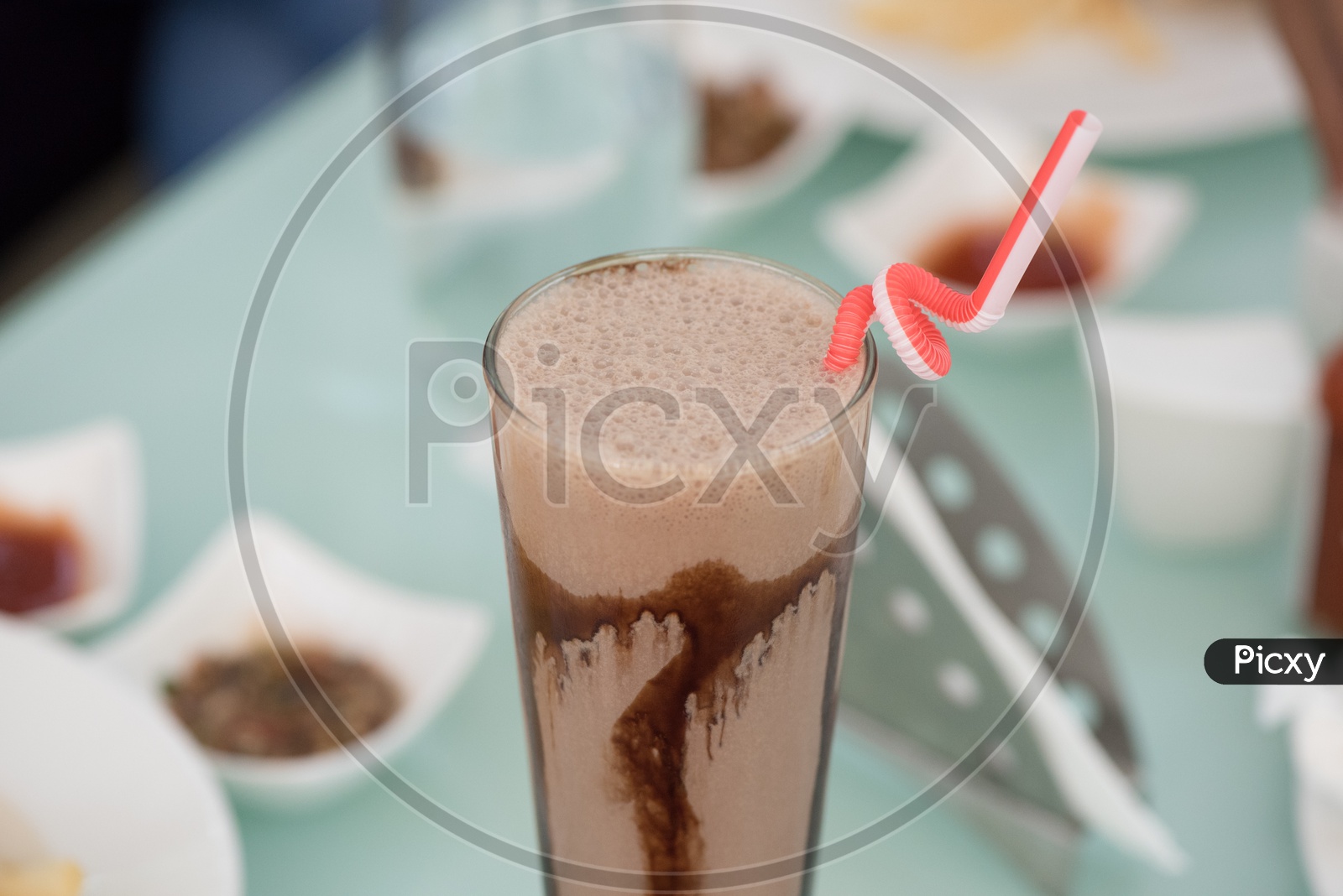 Cold Coffee Served At a Restaurant Table Background