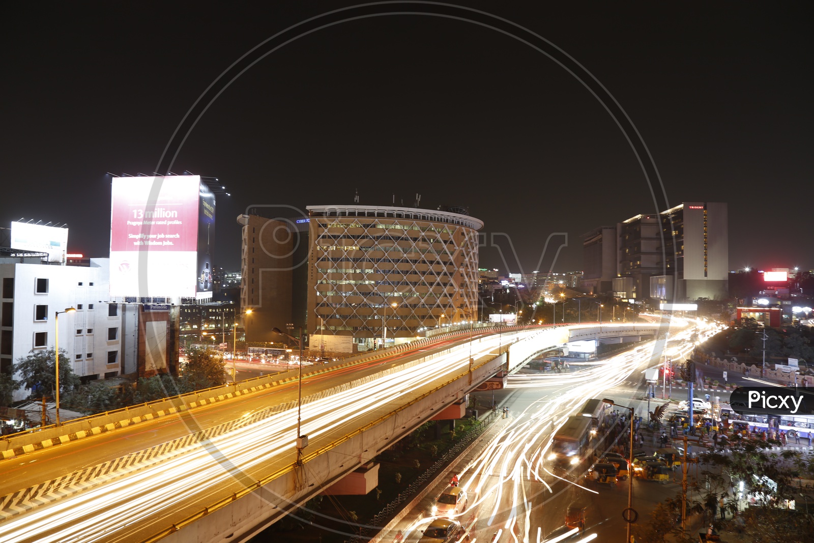 Cyber Towers  With Long Exposure of Light Trail Of Moving Vehicles Over  Hi-Tech City Flyover And At Signal