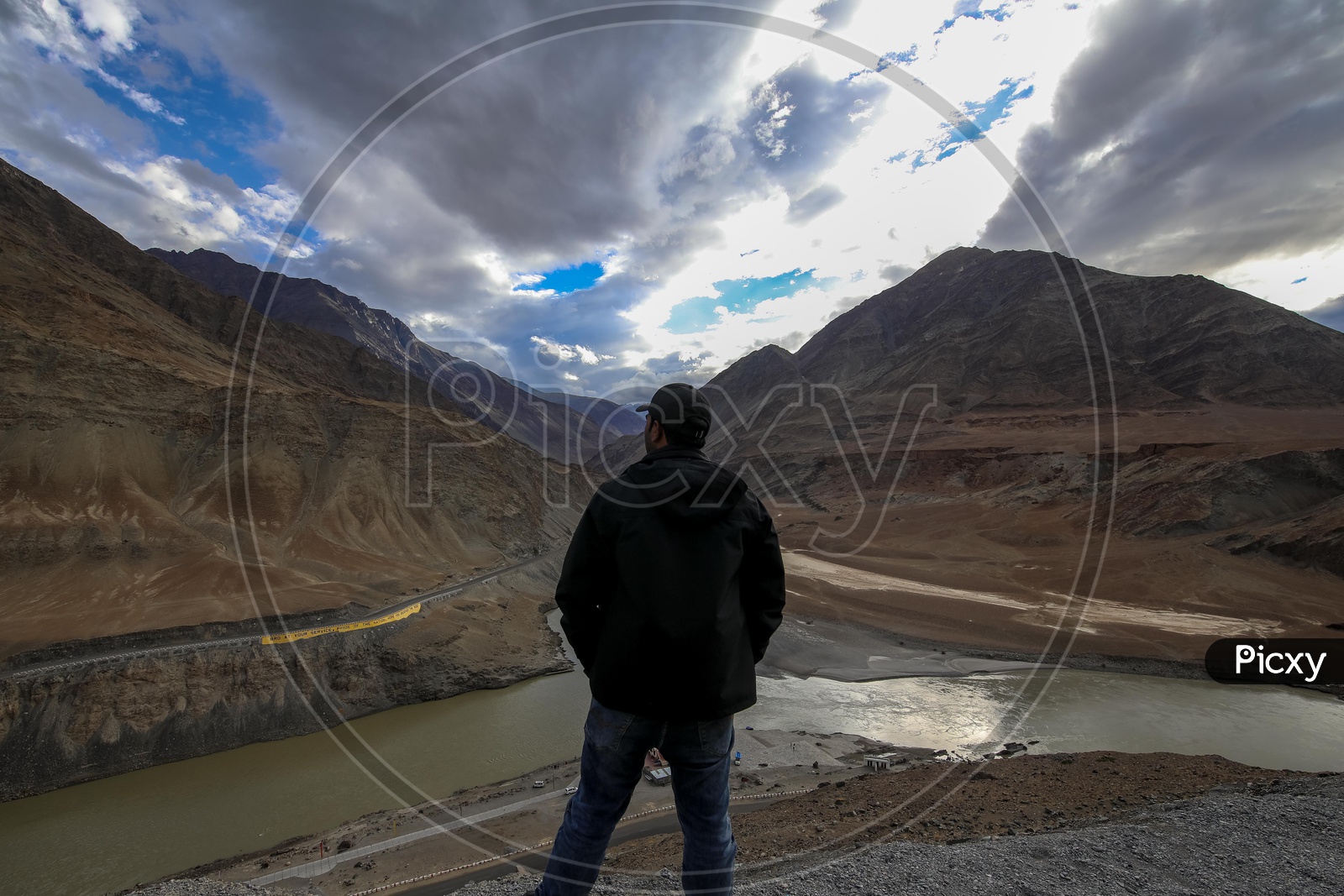 Indian Traveler Enjoying The River Valley Views In  Ladakh