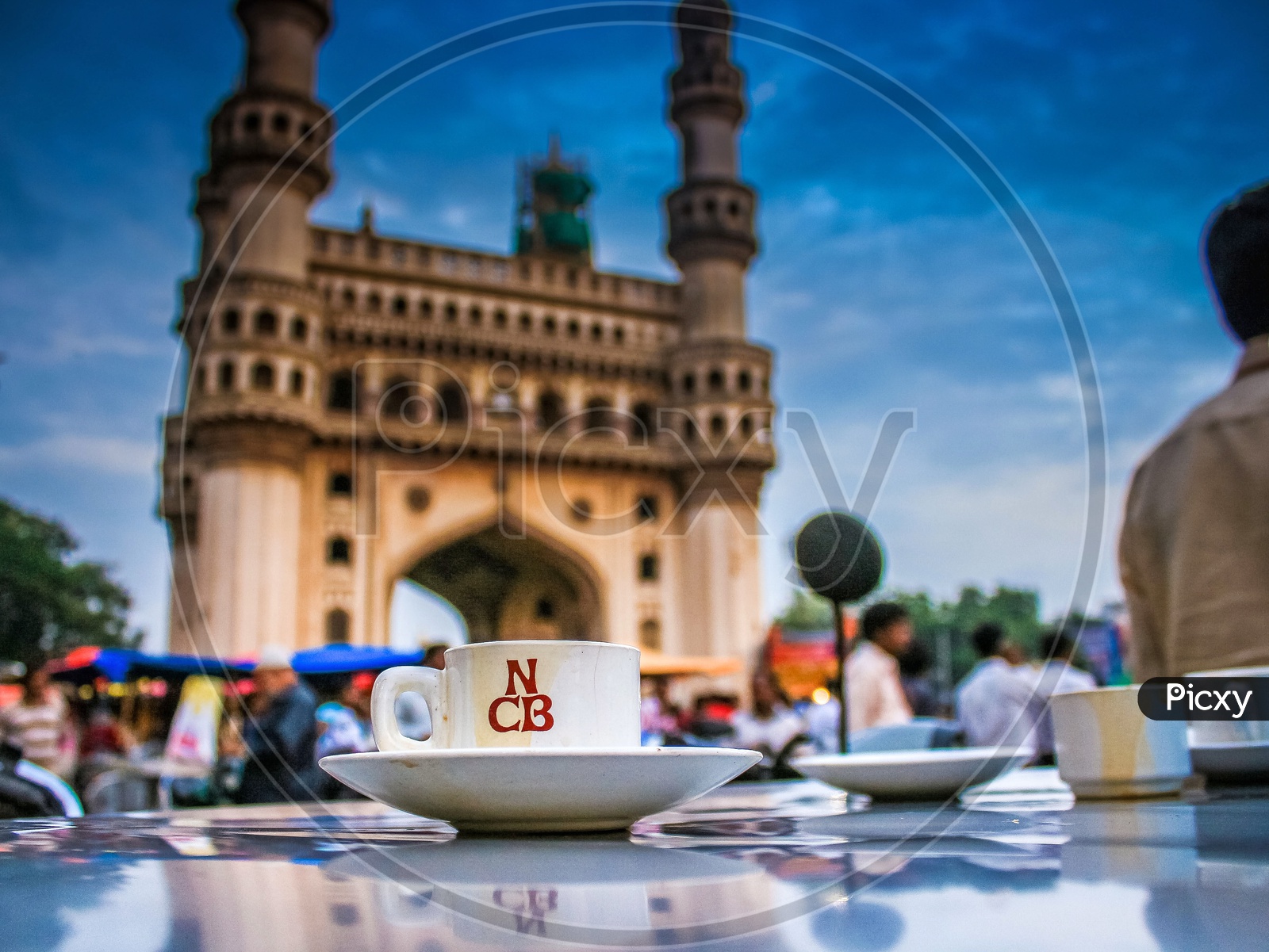 Nimrah Cafe Tea Cup With Charminar in Background