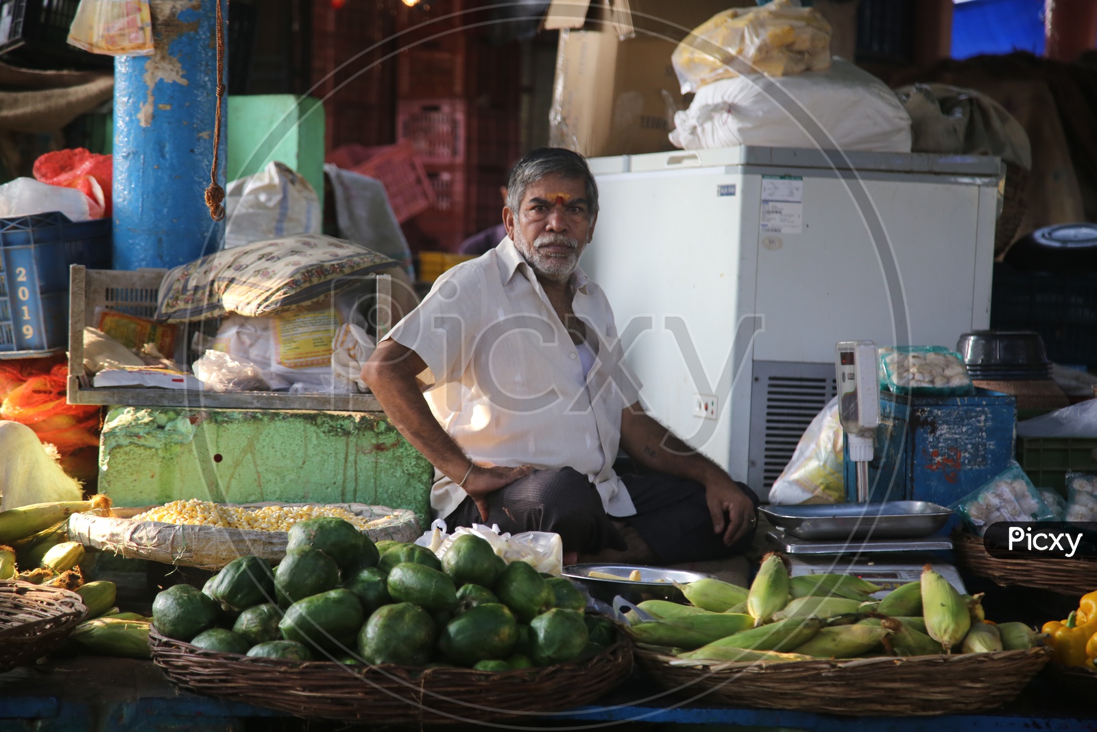 a vegetable seller selling the vegetables
