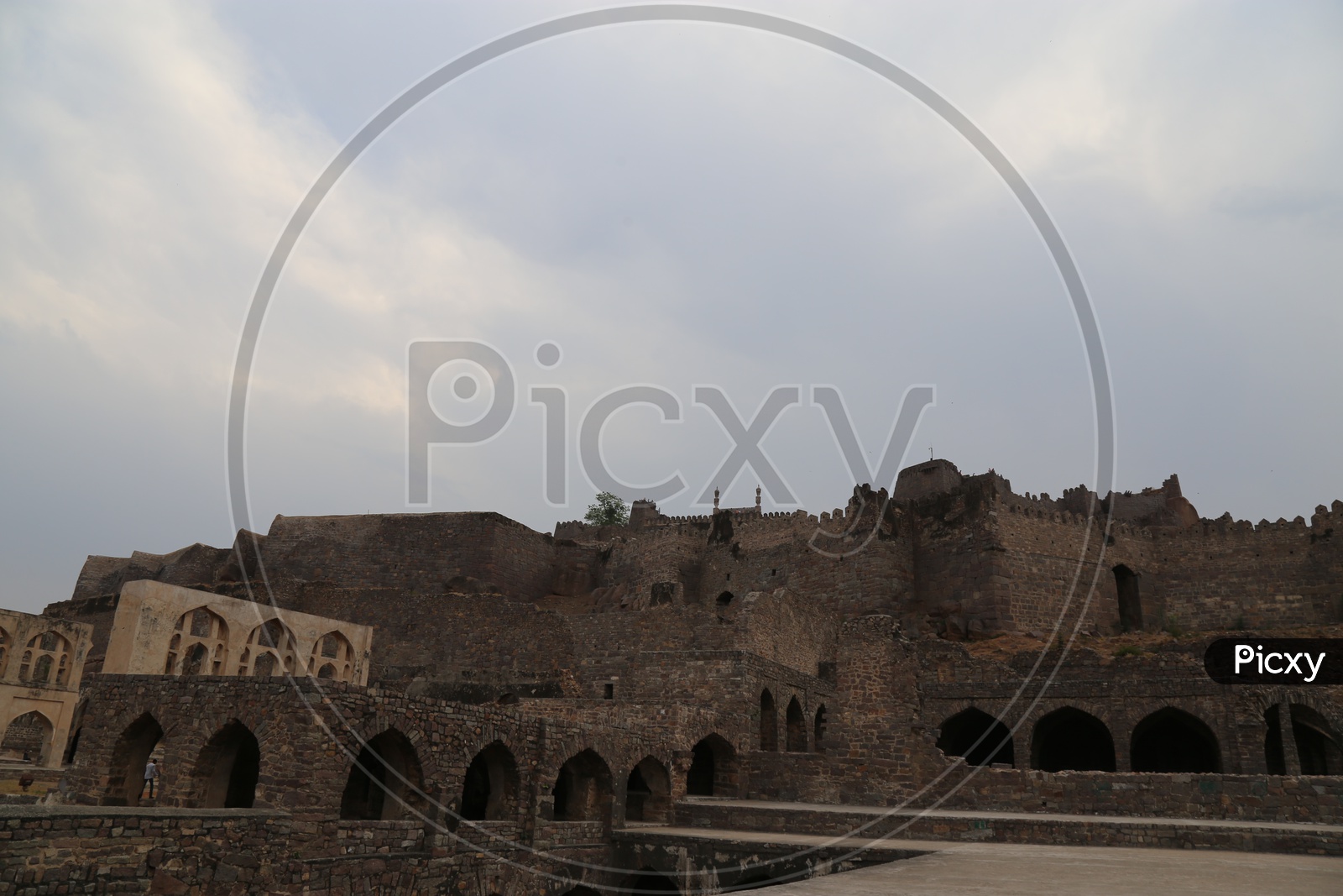 Old Ruins Of Golconda Fort With Blue Sky Background