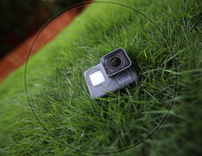 Gopro Hero5 Action Camera In Lawn Garden Grass  Backdrop