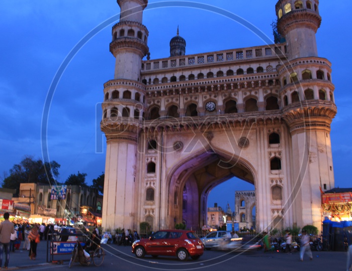 Charminar Composition With  Fast Moving vehicles Around It And Blue hour Sky in Background