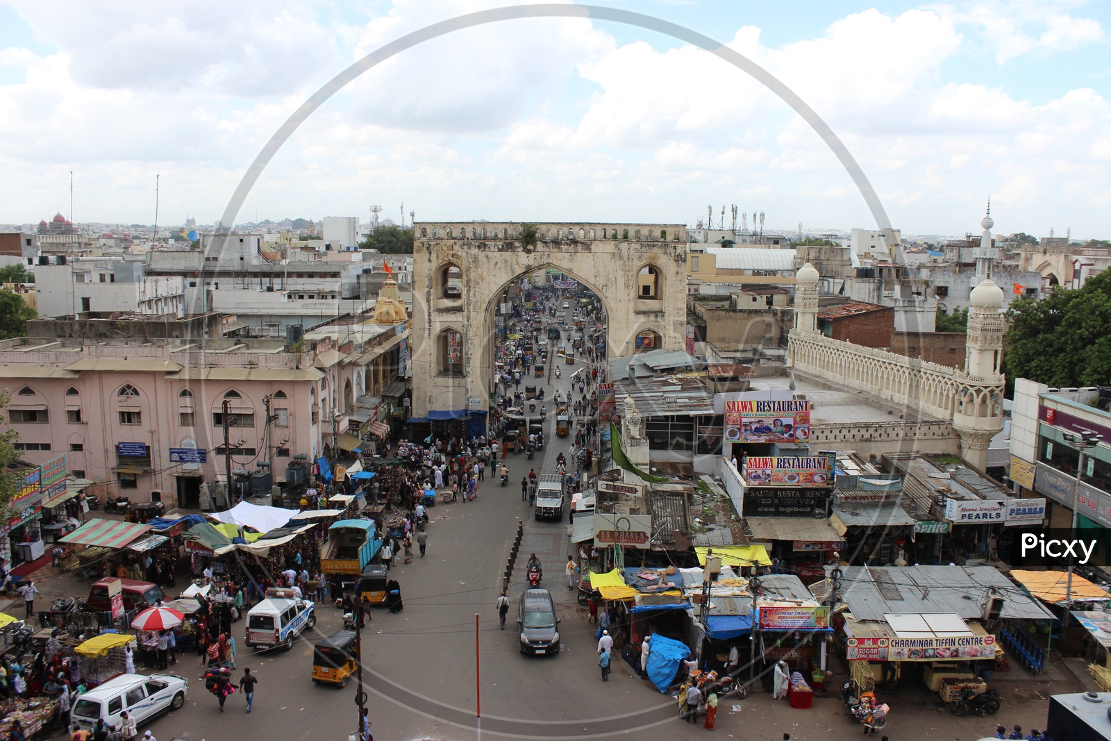Aerial View Of Charminar Streets With  Visitors And Commuting Vehicles