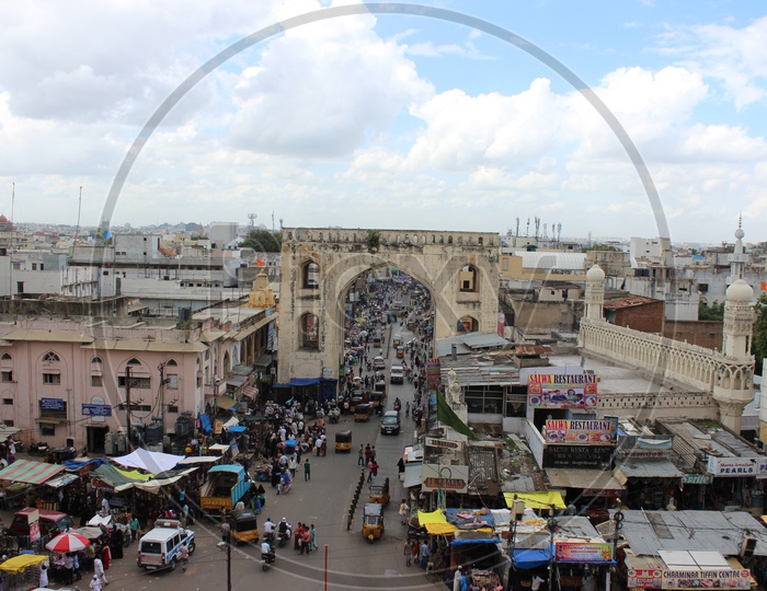Aerial View Of Charminar Streets With  Visitors And Commuting Vehicles