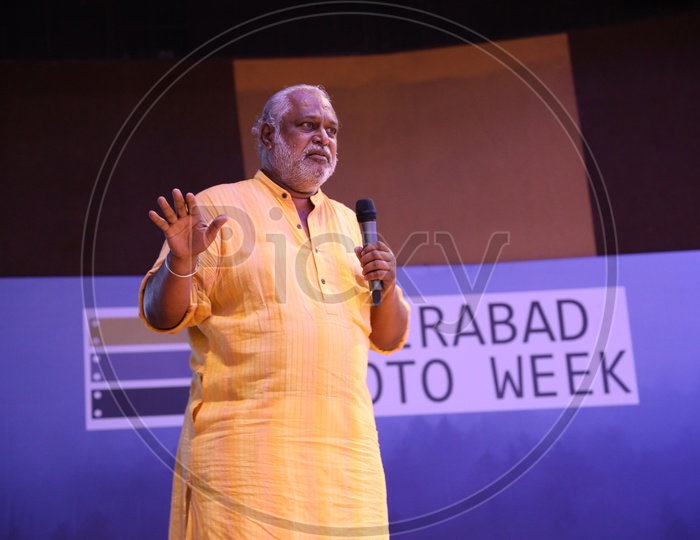 Kommidi Vishwender Reddy Speaking on Stage At Hyderabad Photo Week At State Art Gallery