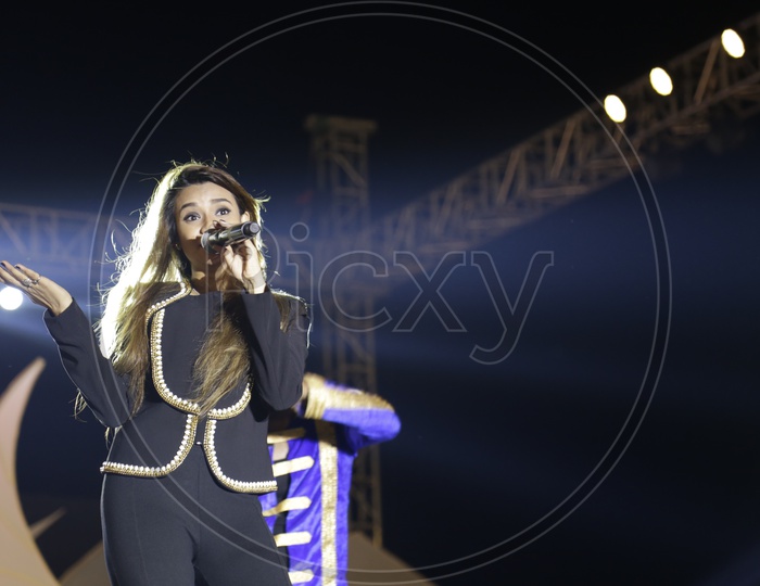 beautiful Girl Performing Live On Stage Singing And Dancing At a Concert At APICON 2016  In Hyderabad