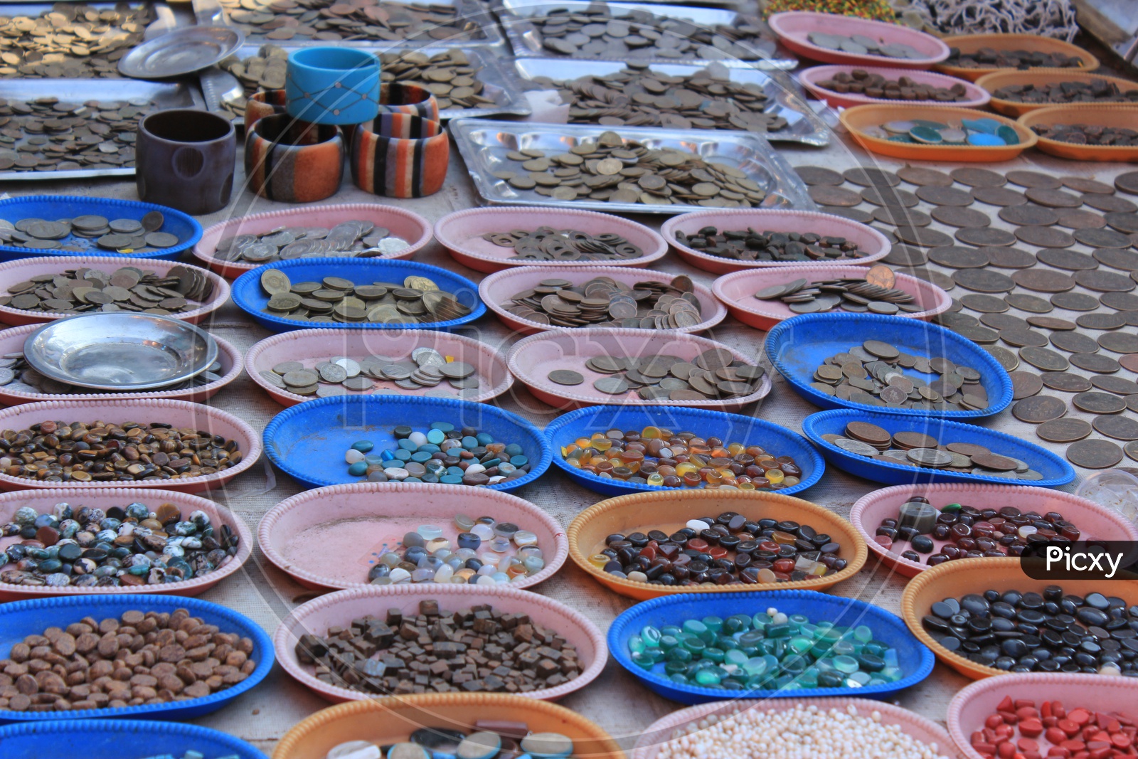 Various Vintage Coins Selling At a Road Side Stall Near Charminar
