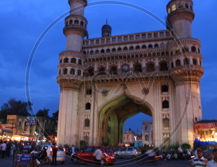 Charminar Composition With  Fast Moving vehicles Around It And Blue hour Sky in Background