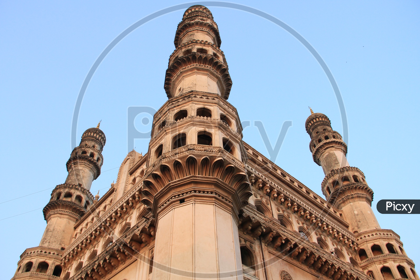 Charminar  Composition With Pillars  And Blue Sky Background