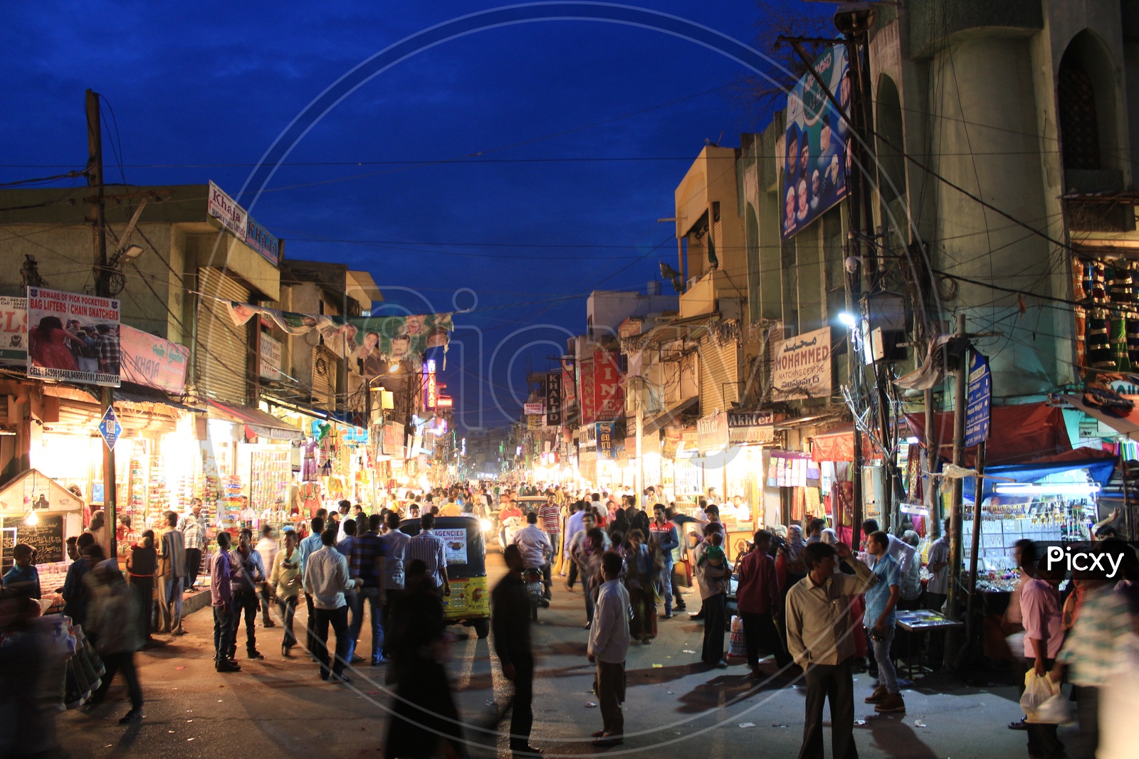 Busy Ghansi Bazaar Street With Visitors  And Bangles Shops In Night Time