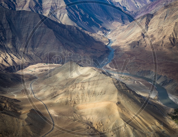 Aerial View Of River Valleys Between Sand Dunes In Ladakh From Flight Window