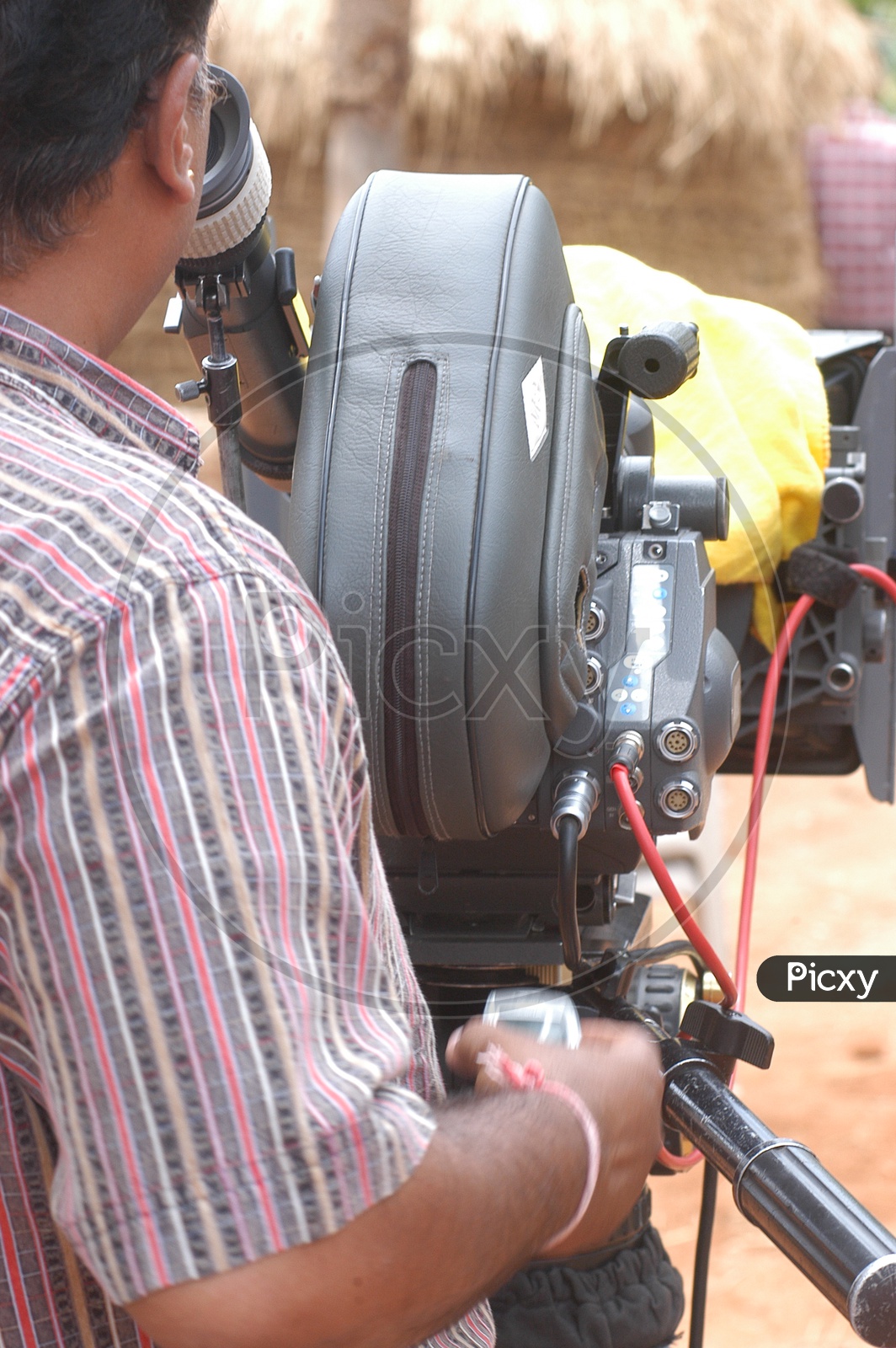 Cameraman in a Telugu Movie Shooting