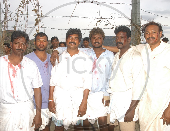 Telugu Movie Artists with Dummy Blood on Shirts while Shooting